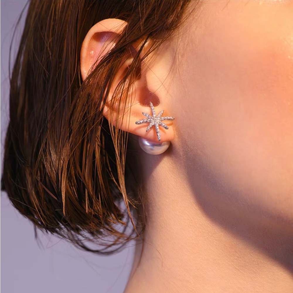 Double sided silver star earrings